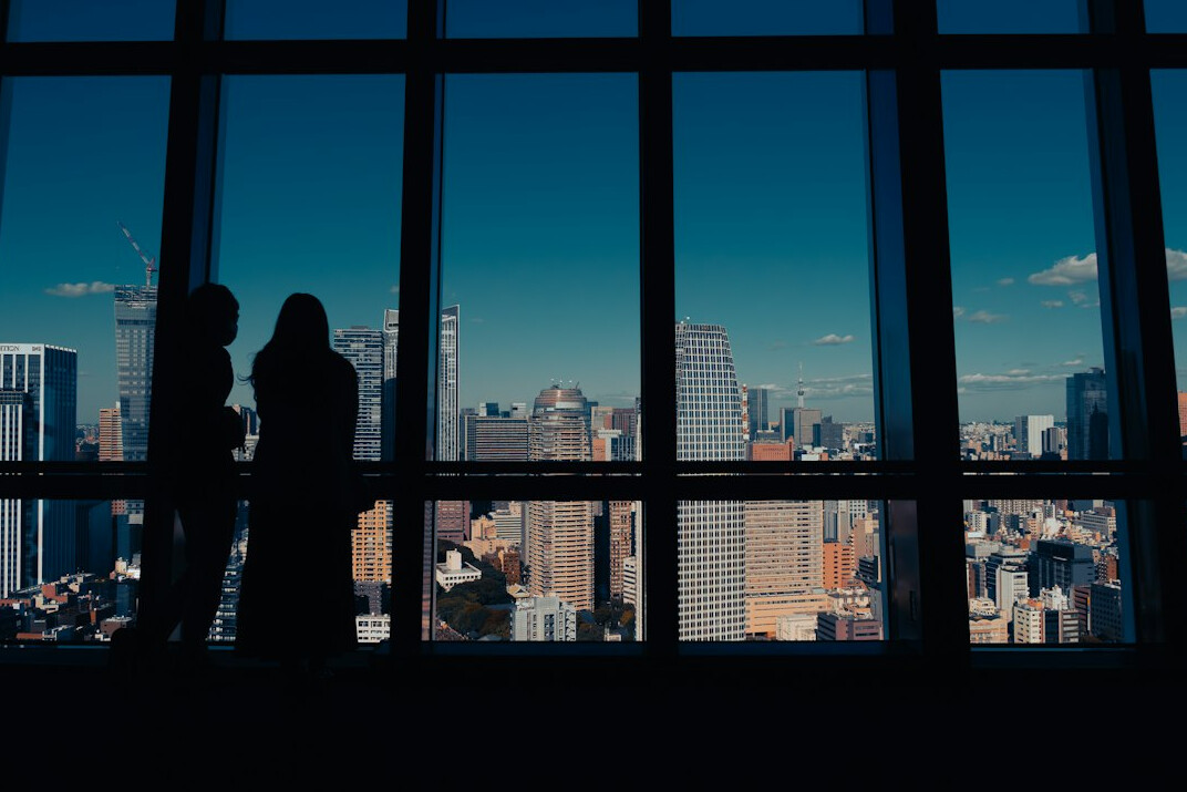 Business professionals negotiating at a conference table